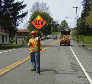 Illuminated flashing Stop Slow Paddle